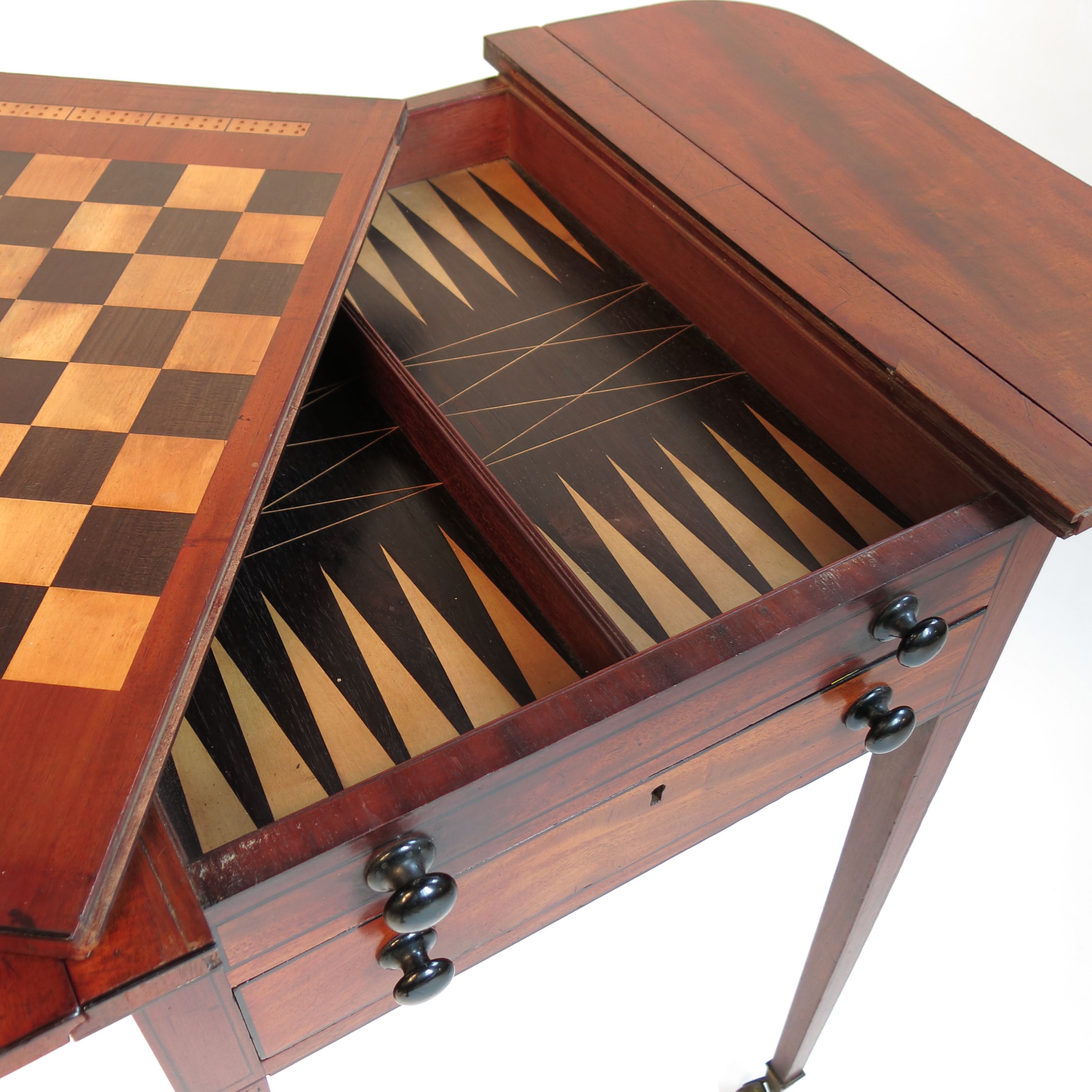 A late Georgian mahogany Pembroke games table, the slide out reversible top with draughts board, - Image 2 of 4