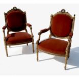 A pair of 19th century gilt salon chairs,