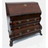 A 19th century Dutch walnut bureau, of bombe form,