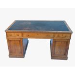 A 19th century oak partners desk,