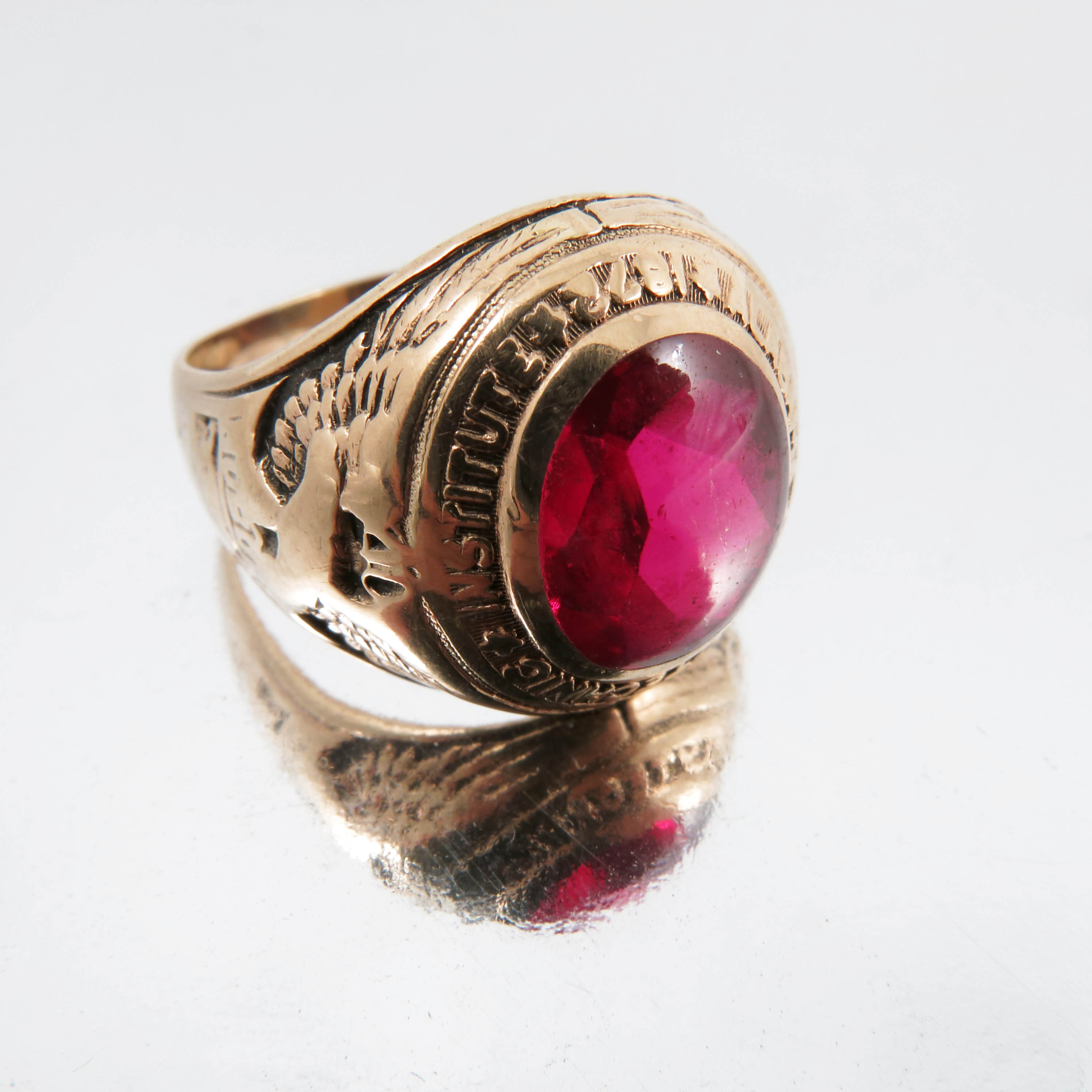Ruby Graduation Ring An American synthetic ruby graduation ring, stamped '10k' and 'Balfour ...