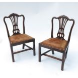 A set of six mahogany Hepplewhite style dining chairs,