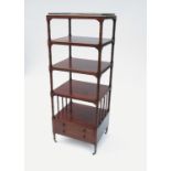 A 19th century mahogany whatnot, having five shelves separated by turned columns,