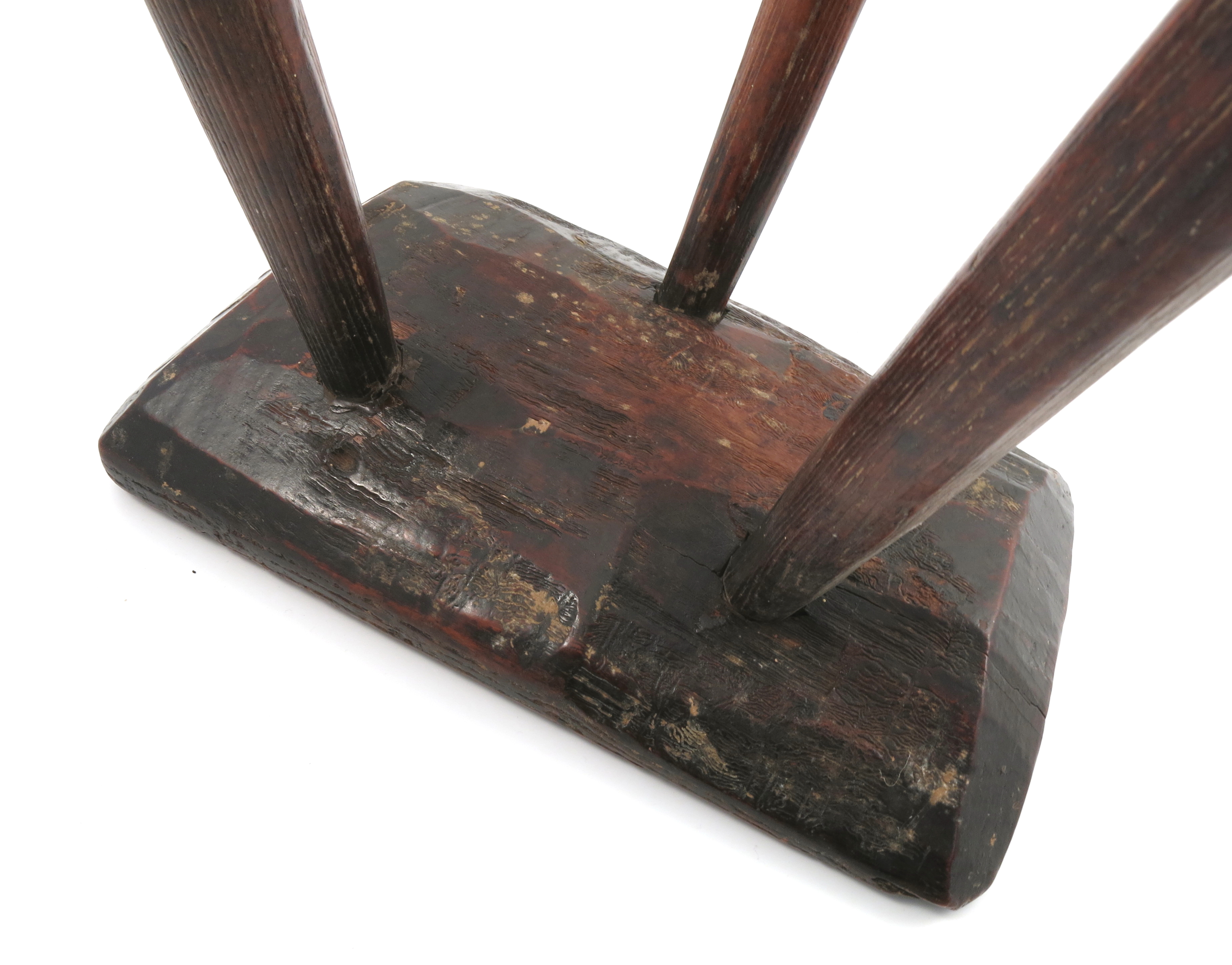 An Antique primitive stool, the rectangular top raised on three legs, 14ins x 9ins x 16. - Image 3 of 3