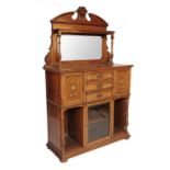 A 19th century walnut side cabinet, having rectangular mirror with shelf over supported by columns,