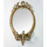 A 19th century gilt framed oval wall mirror,