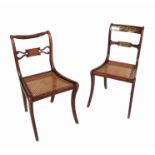 Four Regency dining chairs, three fitted with brass inlay, one with Trafalgar rope bar back,