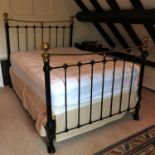 A Victorian style brass and painted double bed,