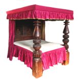 An antique four poster or full tester bed, in Elizabethan style,