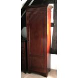 An Edwardian mahogany single door wardrobe, with satinwood and ebonised inlay,