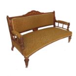 En suite to the above, a 19th century walnut sofa,