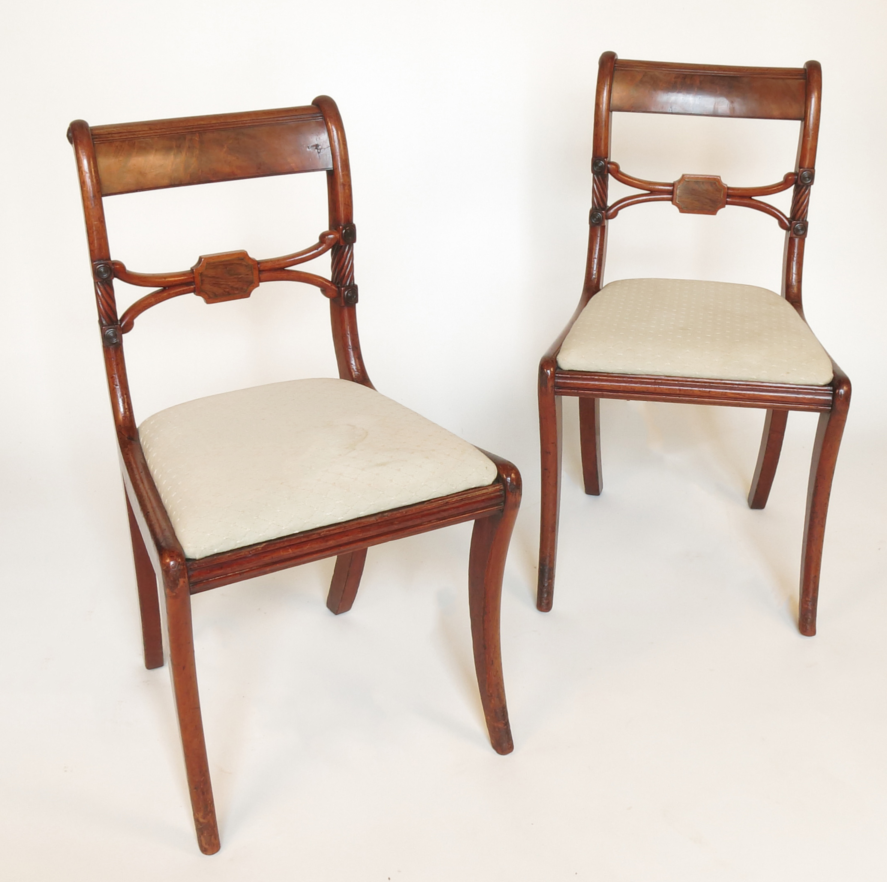 A set of six late Regency mahogany dining chairs,