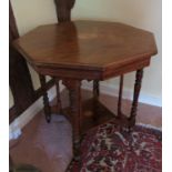 An Edwardian rosewood octagonal centre table, with paterea and boxwood inlay,