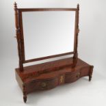 A 19th century mahogany dressing table mirror, the rectangular plate raised on turned side supports,