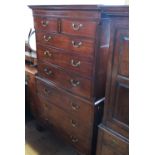 A Georgian mahogany chest on chest, fitted with two short over three long drawers,