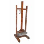 A 19th century oak framed easel,