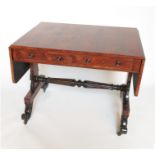 A 19th century rosewood sofa table, fitted with two drawers with dummy drawers to the reverse, 27.