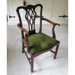 An 18th century Chippendale design mahogany armchair, with pierced back,