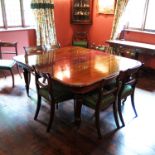 A 19th century mahogany extending dining table, raised on four turned legs, 59.5ins x 112.