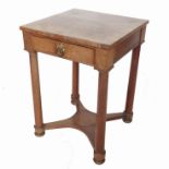 An Empire style mahogany table, fitted with a frieze drawer,