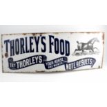 An enamel sign, Thorley's Food, printed with a horse,