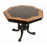 An Edwardian octagonal topped ebonised and pollard oak centre table,