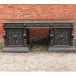 An oak sideboard, fitted with three frieze drawers with two moulded cupboard doors below,