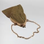 A 9 carat gold mesh evening purse, London import marks 1925, with cabochon set clasp,