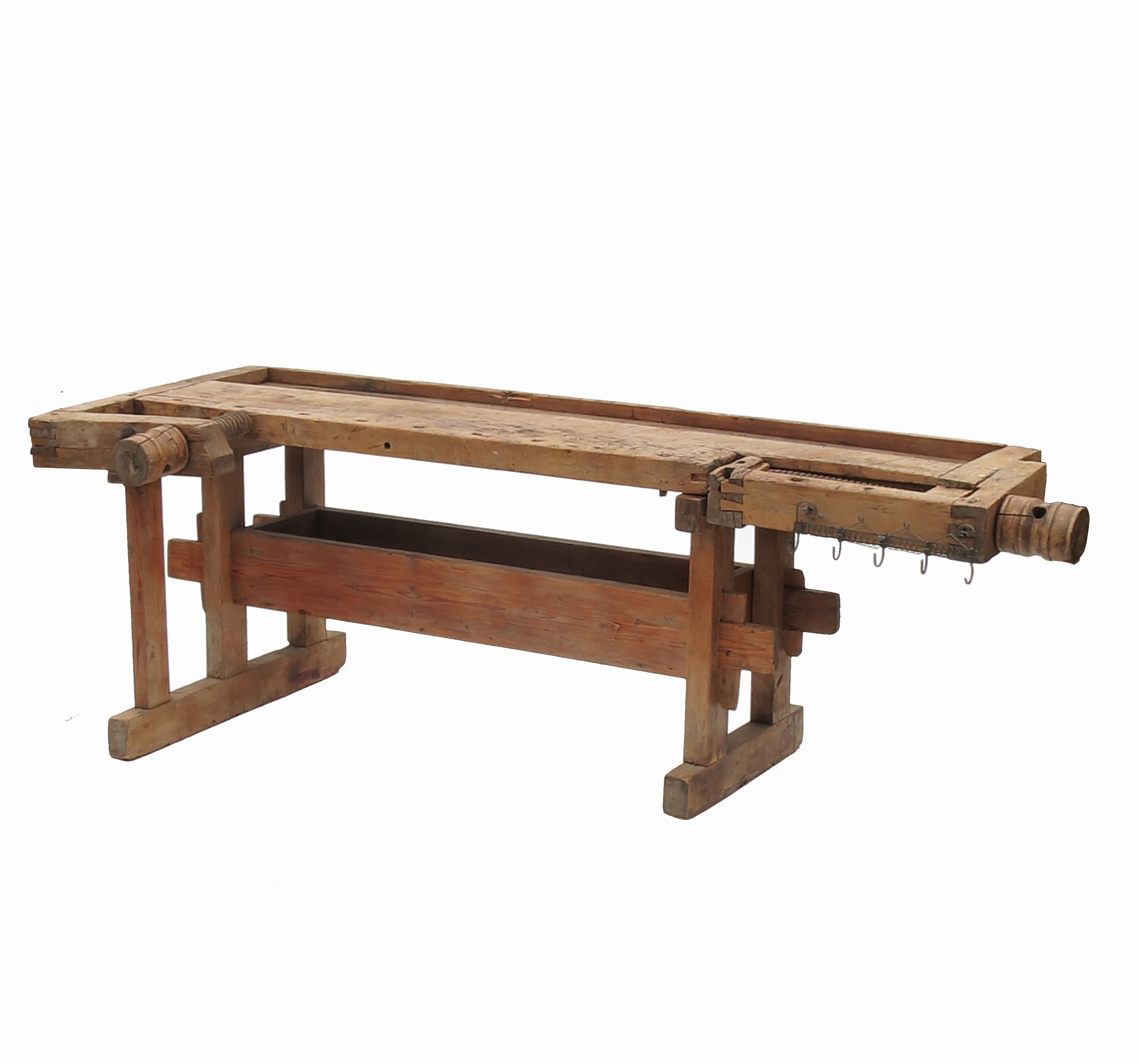 A vintage workbench of rectangular form,