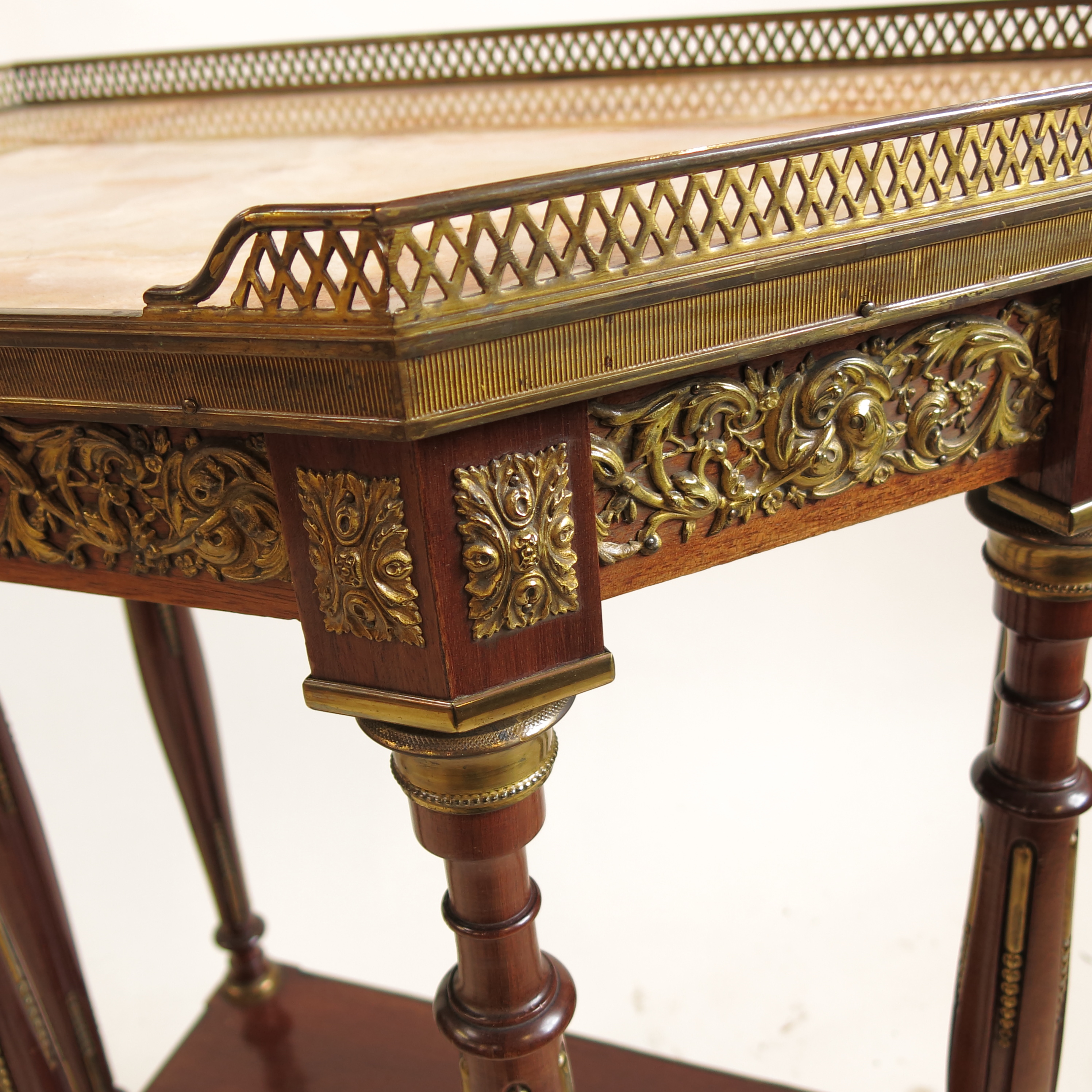 A Continental style side table, with elongated hexagonal marble top, with gilt metal mounts, - Image 2 of 2