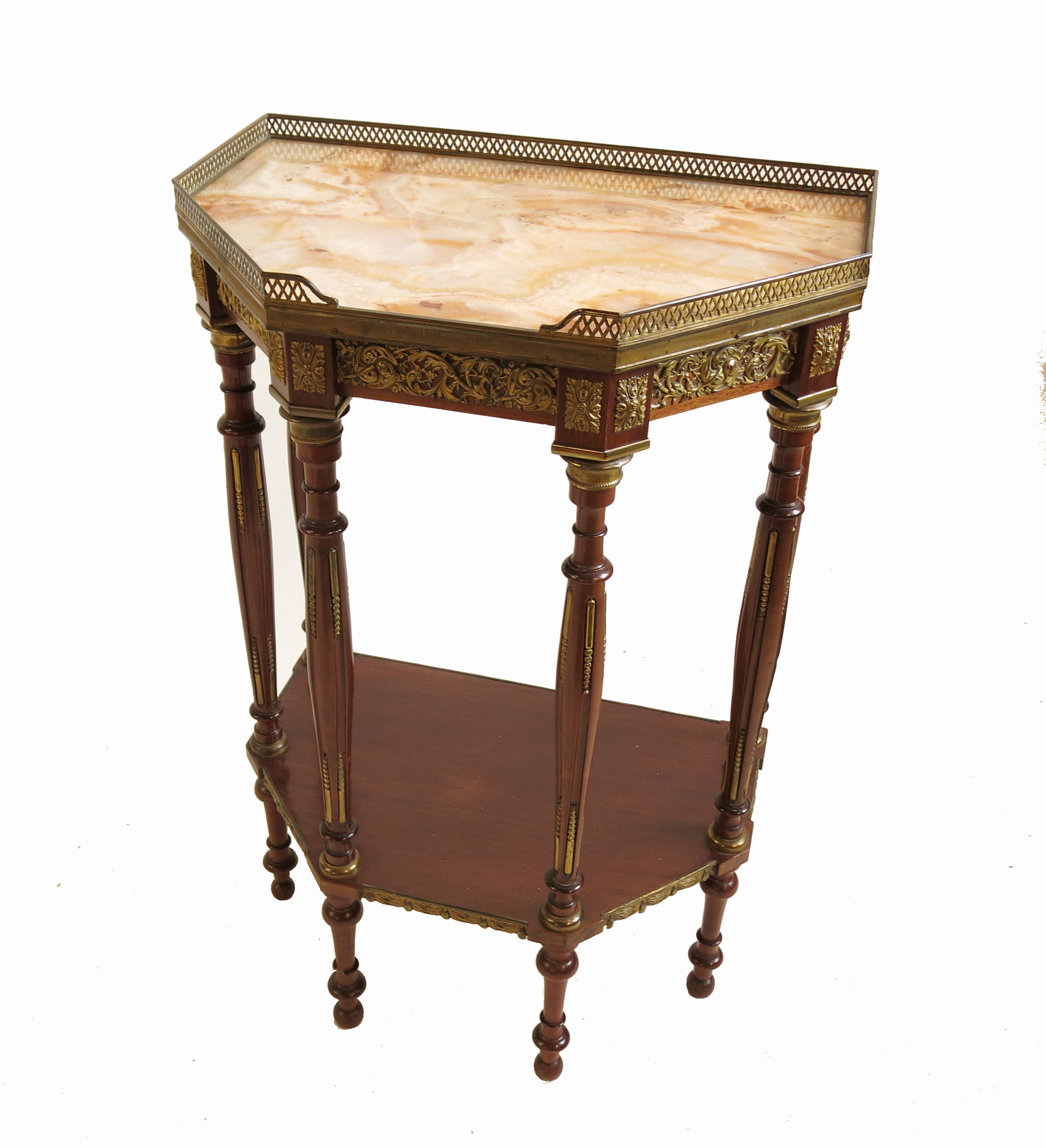 A Continental style side table, with elongated hexagonal marble top, with gilt metal mounts,