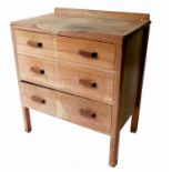 A 20th century limed oak dressing chest, in the Heals style,