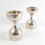 A pair of Robert Welch silver candlesticks, from the Dumbbells range, London 1975,