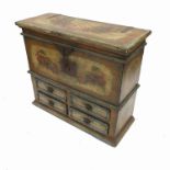 A mahogany painted mule chest, with a rising lid, fitted with four short drawers below,