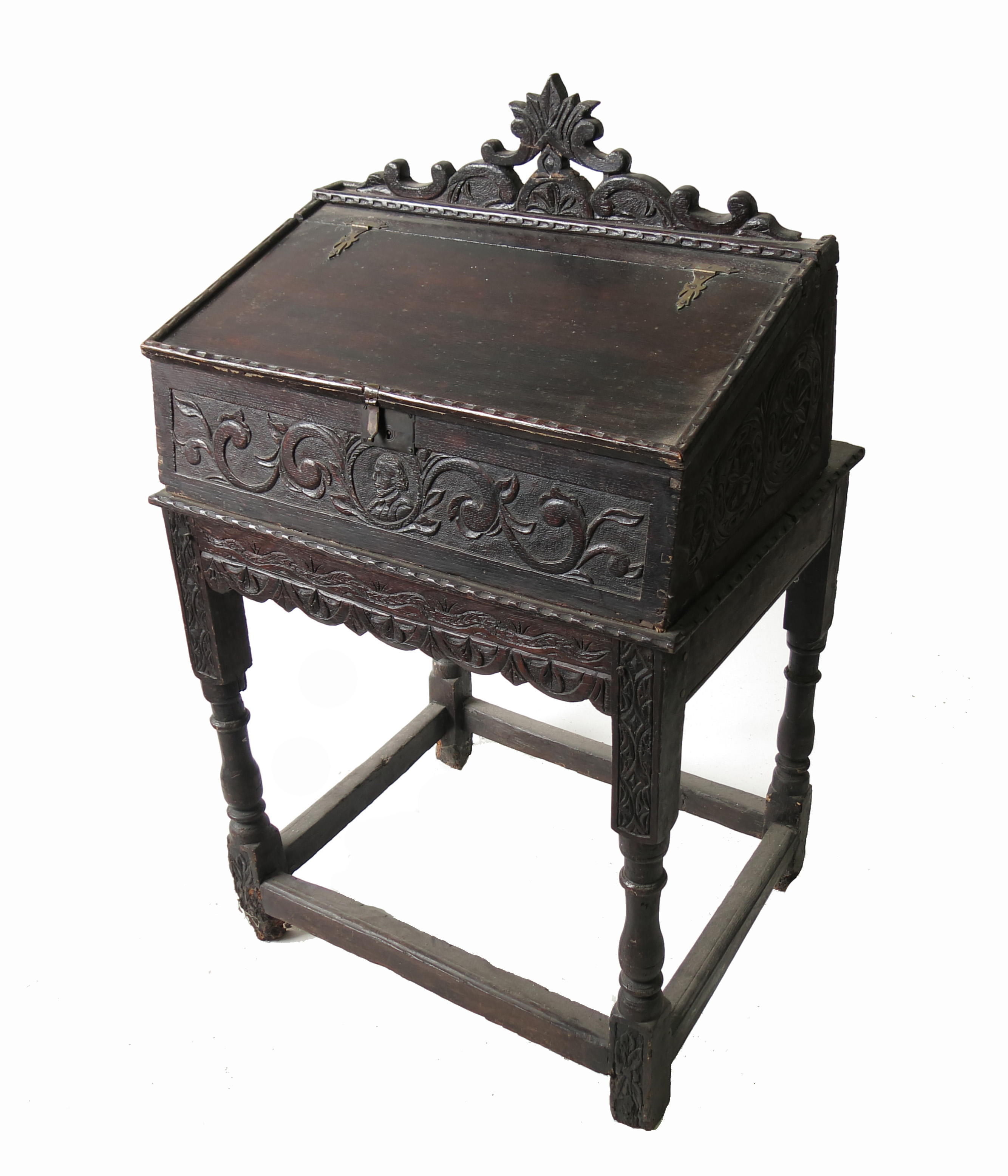 An Antique bible box, raised on a stand, with carved decoration, width 26ins,