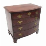 A small mahogany bow front chest, of four graduated long drawers with boxwood line inlay,