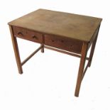 A Cotswold School oak rectangular table, fitted with two short frieze drawers,