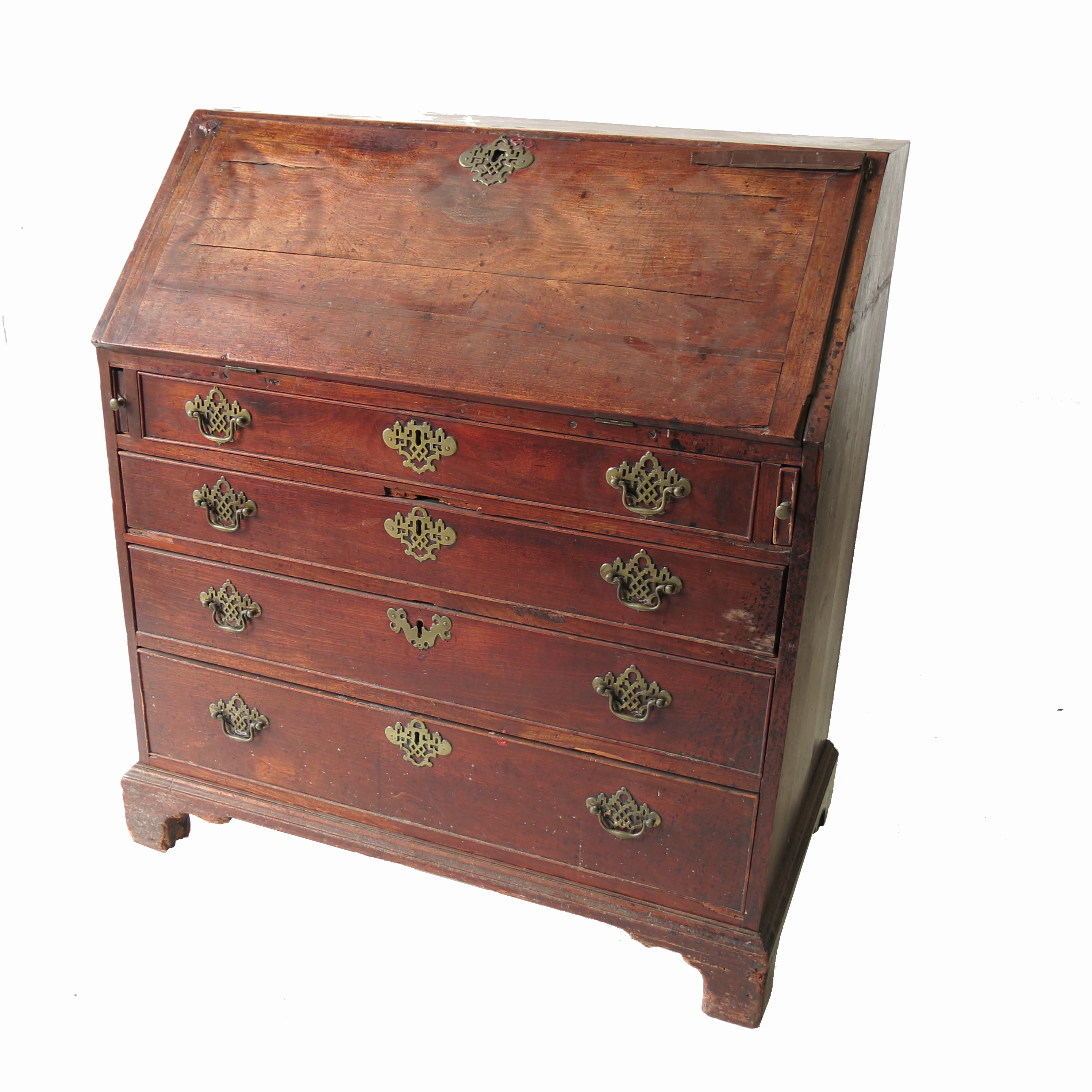 A Georgian mahogany bureau, the fall flap opening to reveal drawers and pigeon holes,