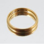 A 22 carat gold wedding ring, 3.