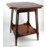 An Art Nouveau walnut occasional table, the top with concave corners on pierced square tapered legs,