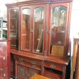 A late 19th century red walnut breakfront sideboard,