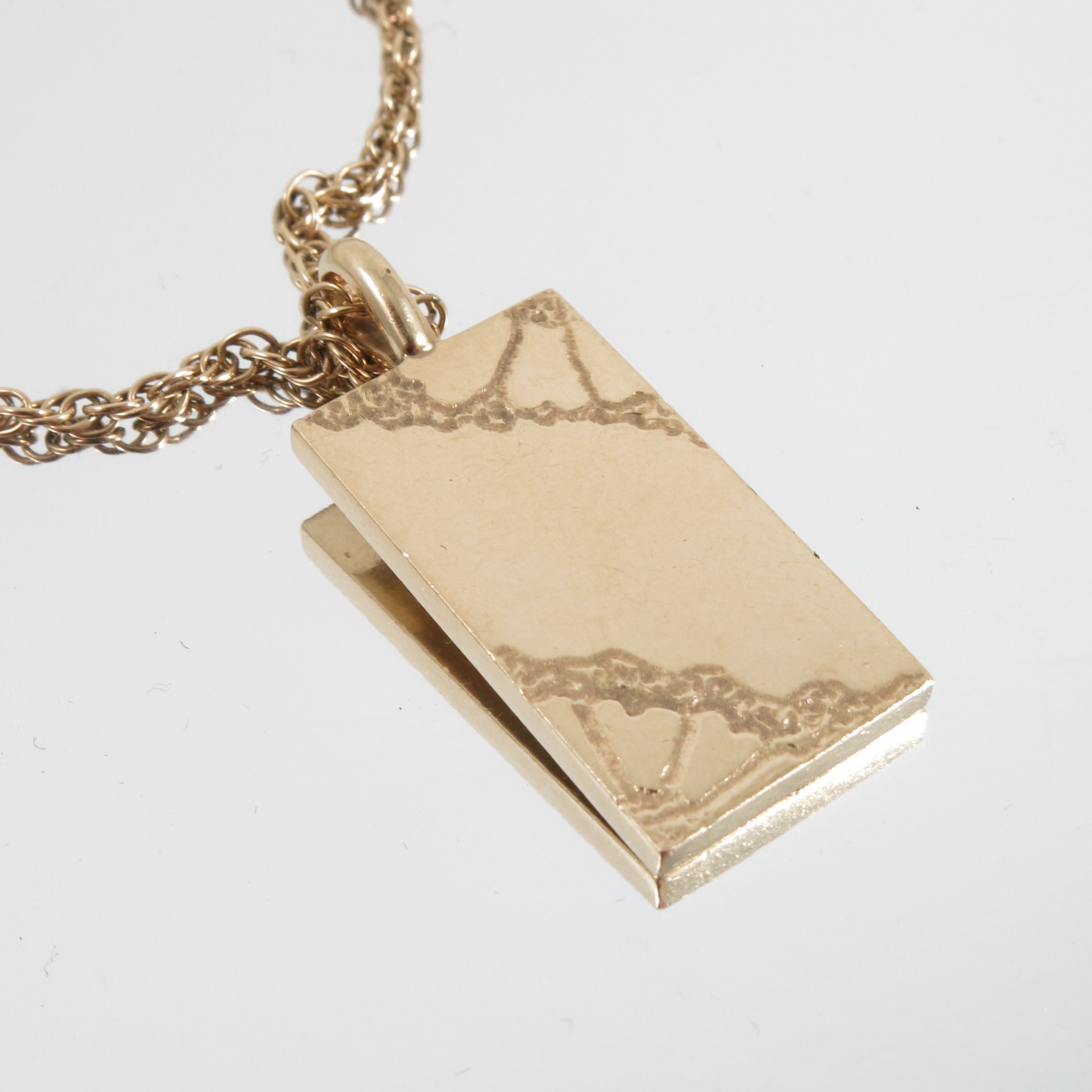 A 9 carat gold ingot, with engraved decoration, - Image 3 of 4