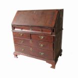 An early 18th century walnut bureau,