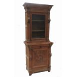 A continental oak cupboard,