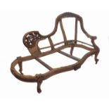 A 19th century walnut chaise longue frame, with one high back end,