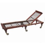 A mahogany campaign or day bed, with adjustable back by Robinson & Son of Yorkshire,