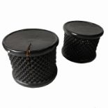 A near pair of Bamileke carved tables, of drum form with pierced sides, one split, diameter 24ins,