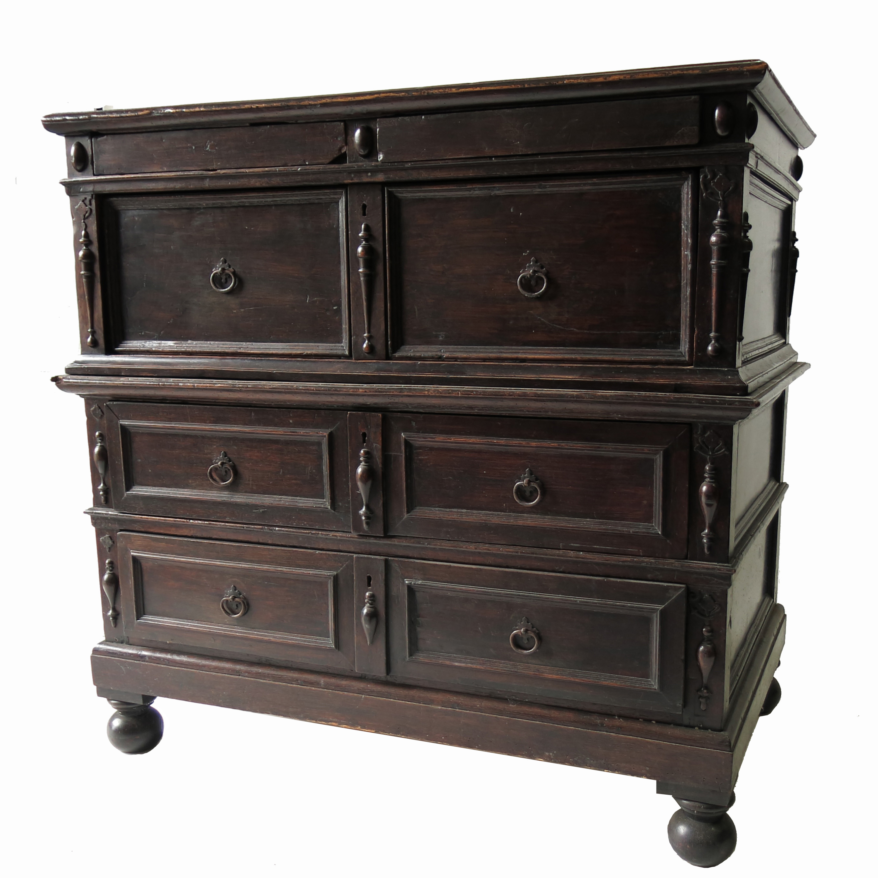 An Antique oak chest on stand, fitted one deep drawer below two secret shallow drawers,