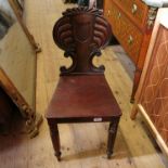 A 19th century mahogany hall chair