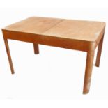 A 20th century beech Heal and Son dining table,